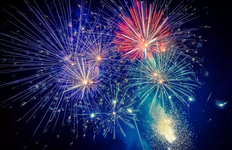 colorful fireworks exploding in the night sky