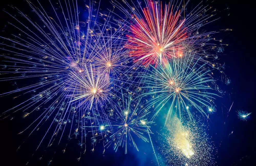 colorful fireworks exploding in the night sky
